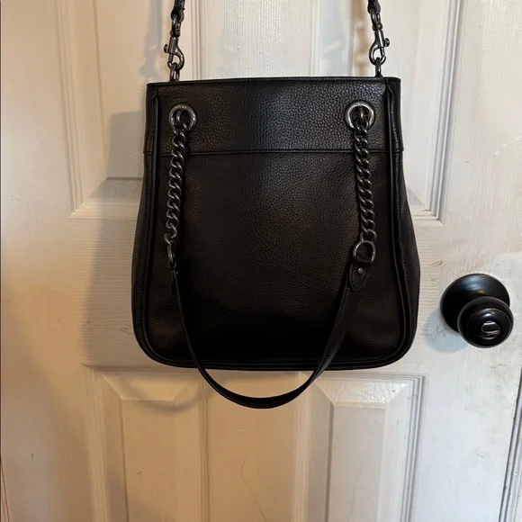 Coach, leather bucket bag with gun metal hardware extra Crossbody strap!
